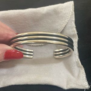 A beautiful James Avery vintage cuff bracelet!! It is a heavy solid piece !